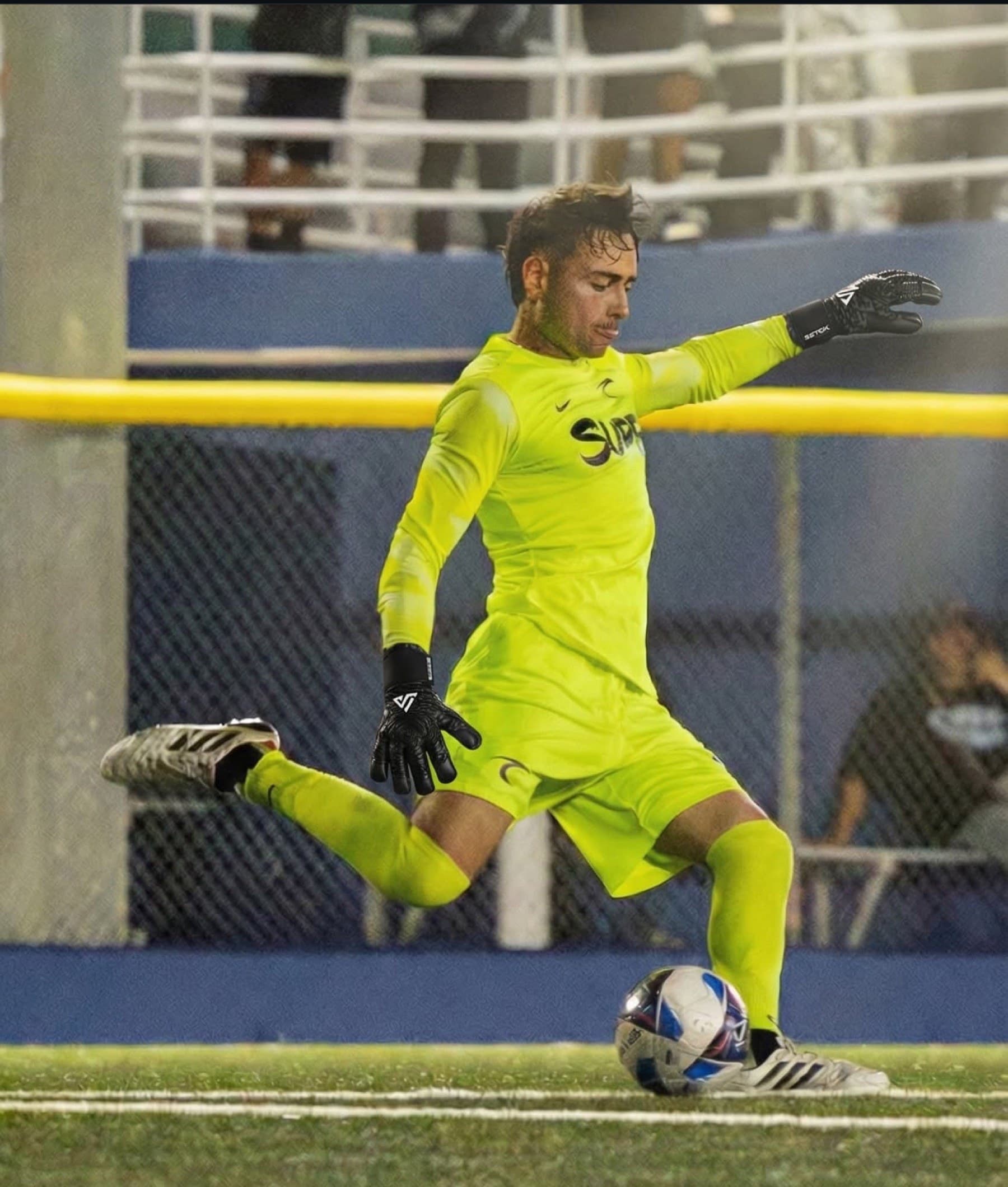 Lucas Espada striking the ball during a match